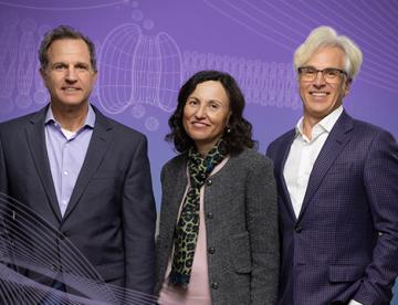 An image of Paul Negulescu, Sabine Hadida and Fred Van Goor smiling in front of a purple background